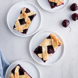 cherry pie bars on plates.