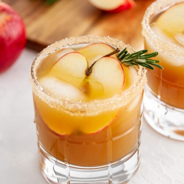 harvest apple ginger smash in a glass on a surface.
