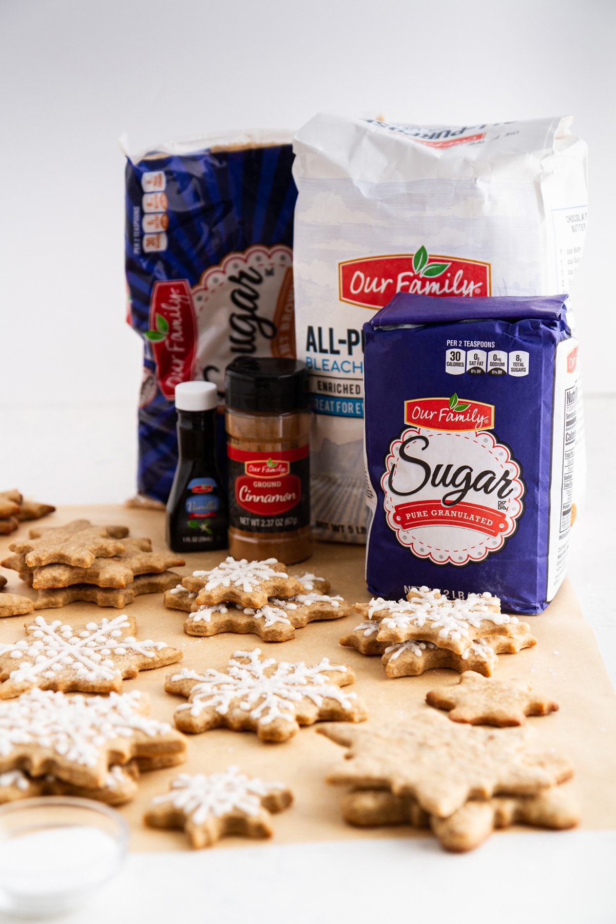 eggnog latte cutout cookies with baking products in the background