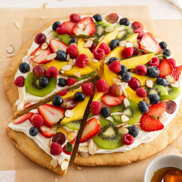 fruit pizza on parchment paper.