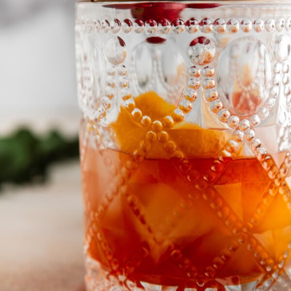 cranberry old fashioned in a glass.