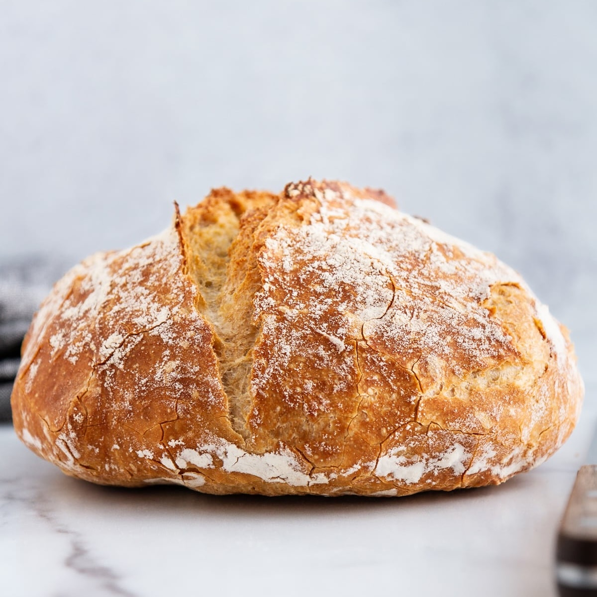 no knead dutch oven bread loaf unsliced.