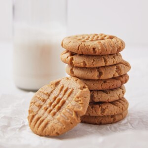 stacked peanut butter cookies with criss cross top.