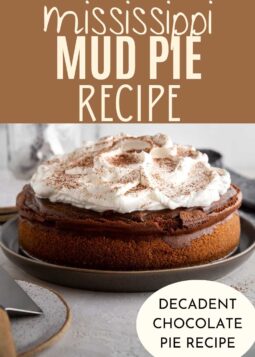 mississippi mud pie unsliced with whipped cream topping and text overlay.