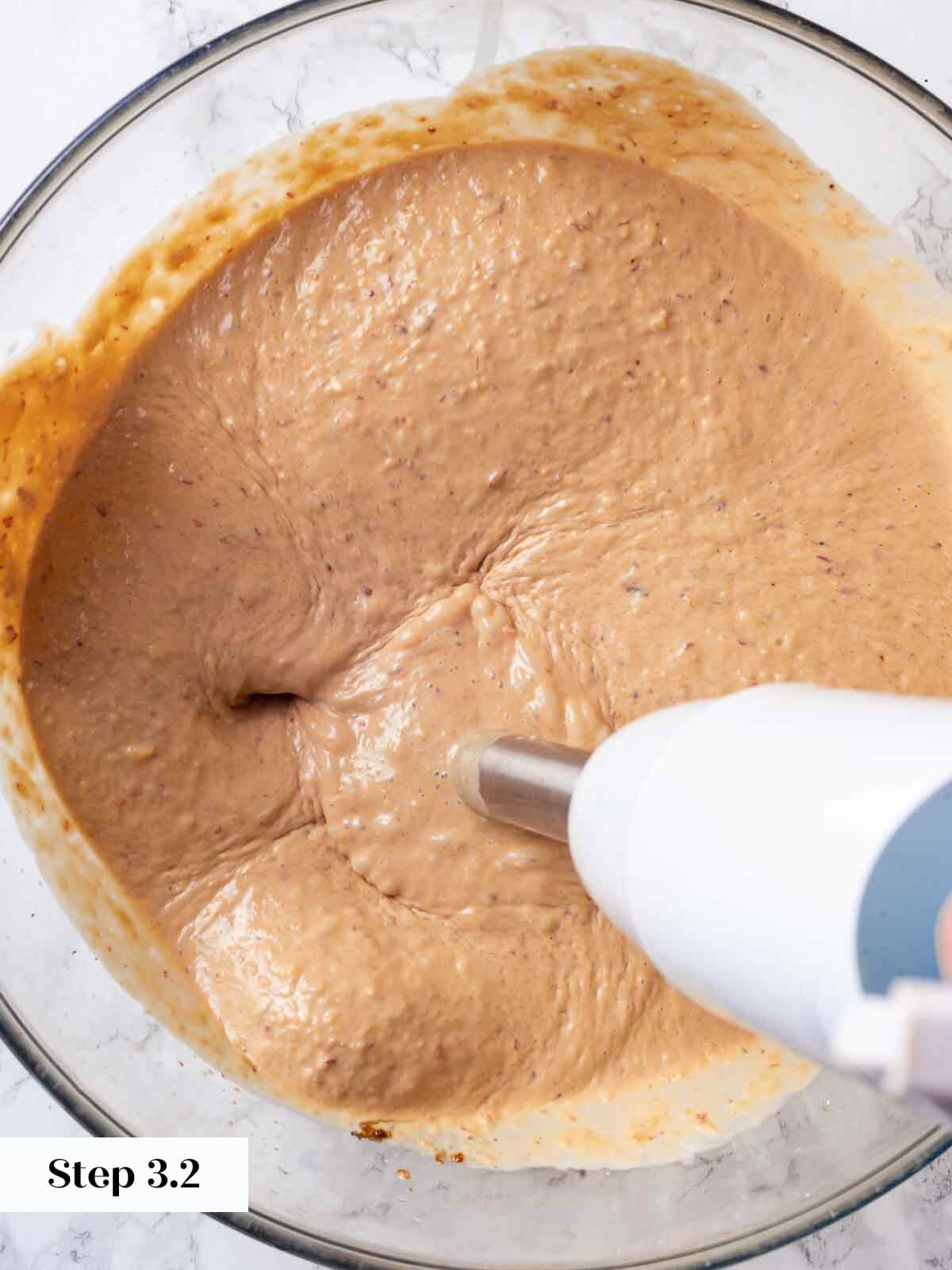 Peach ice cream process using an immersion blender.