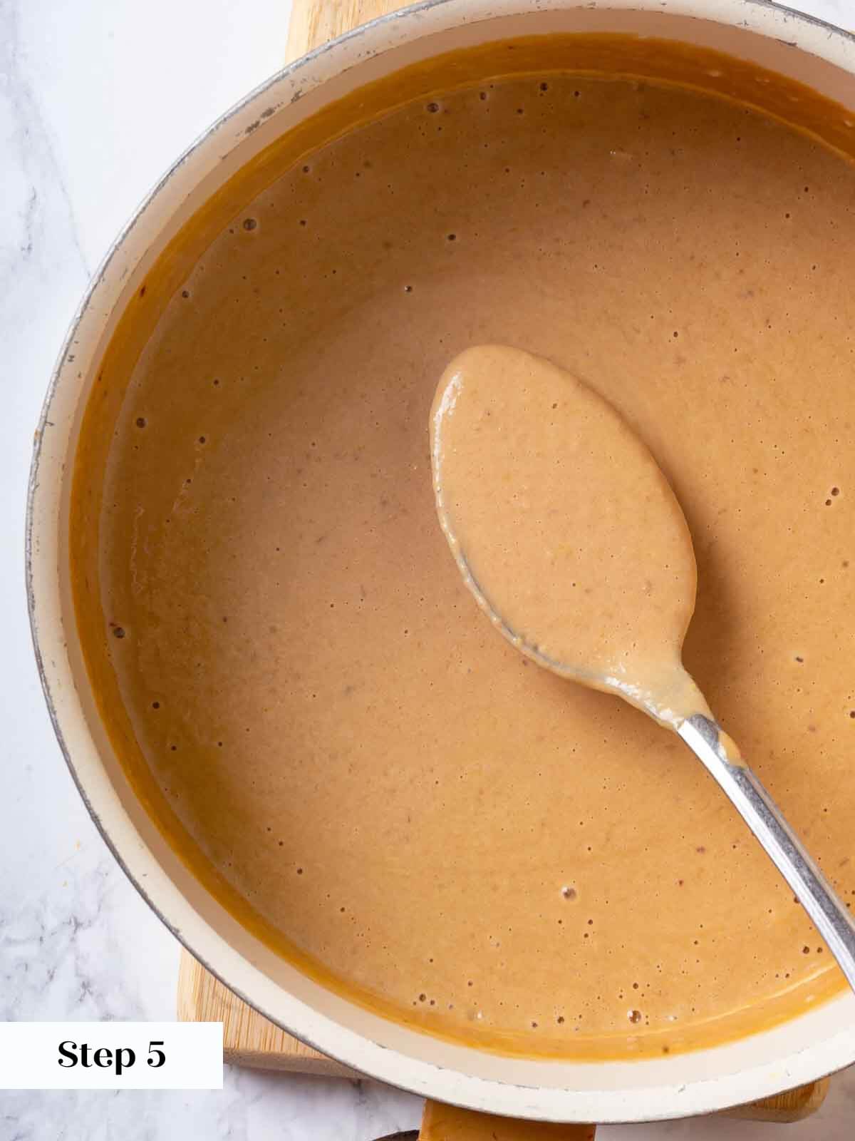 Peach ice cream process using a sauce pan.
