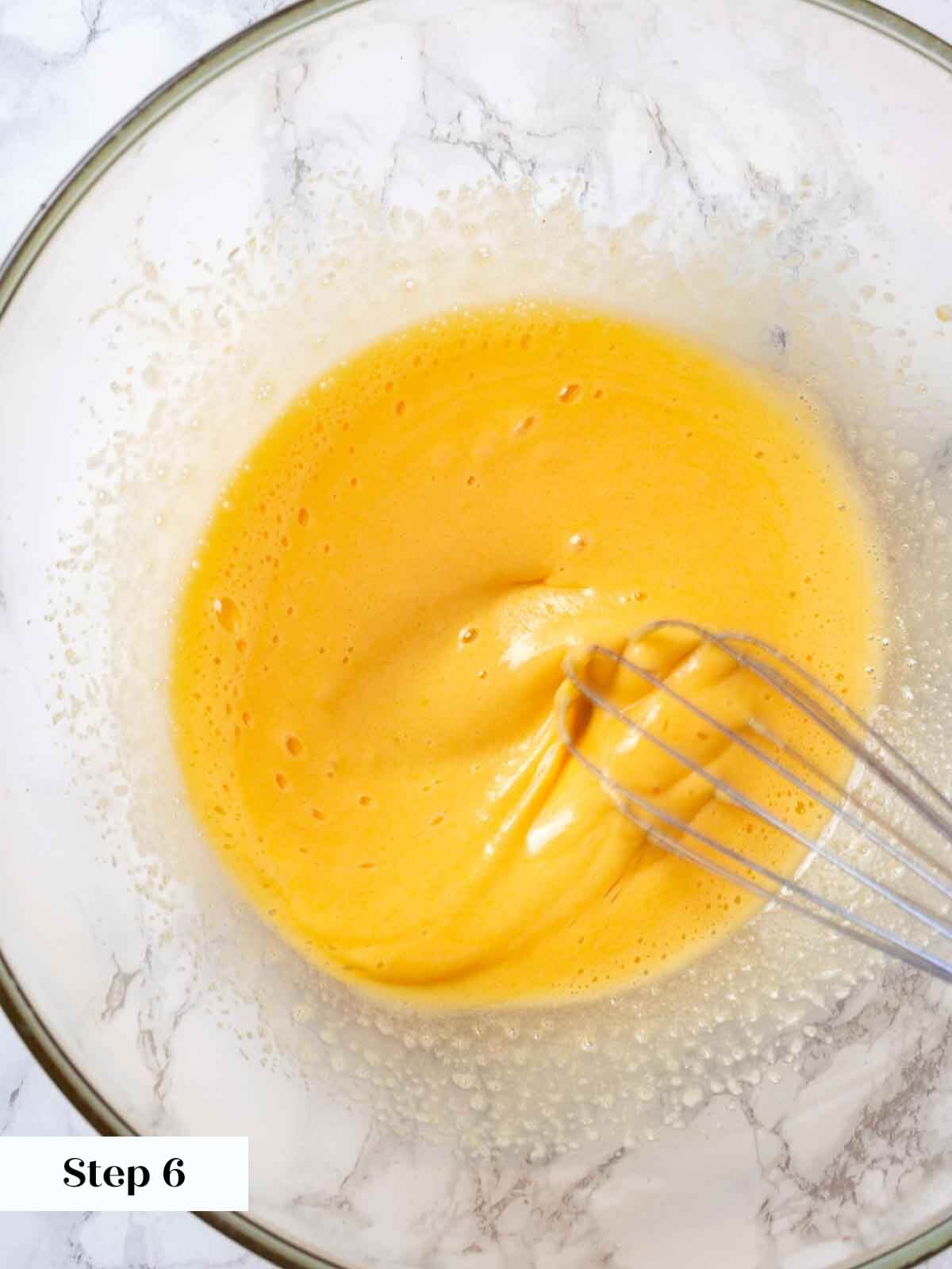 Peach ice cream process whisking yolks.