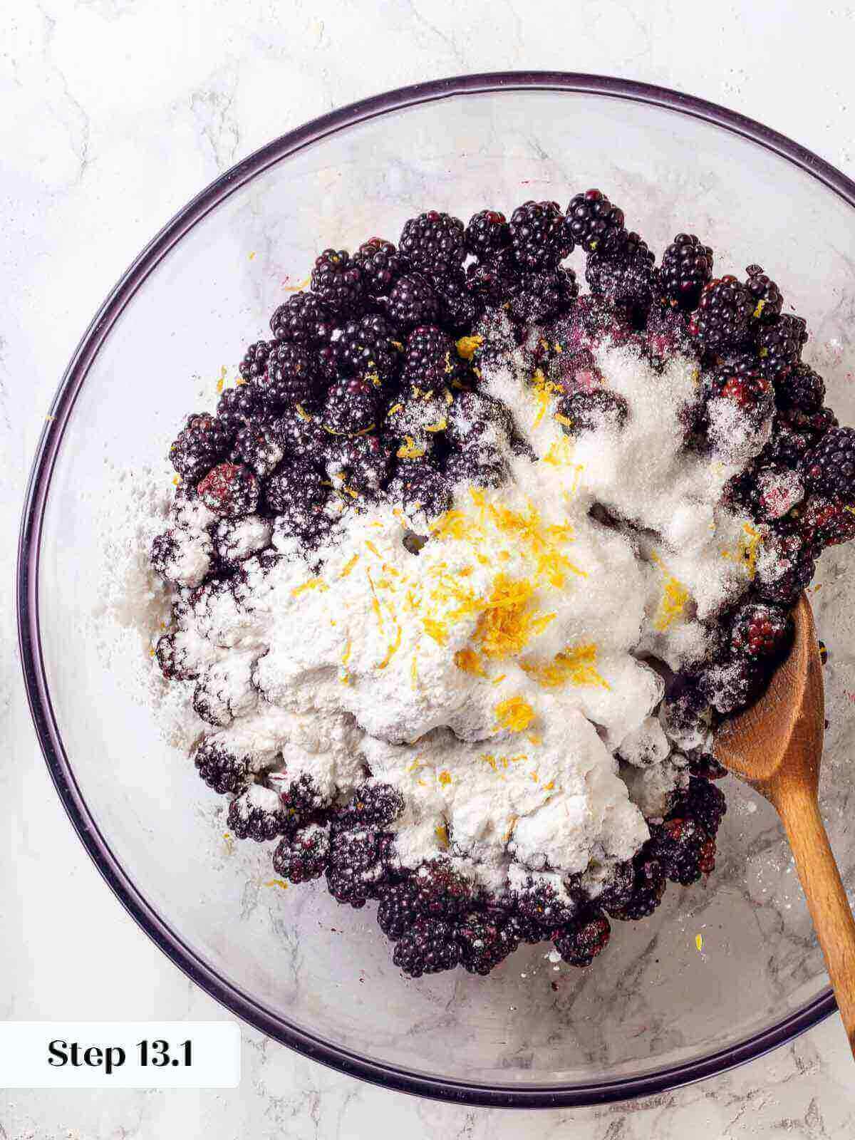 Ingredients for blackberry pie filling in a clear bowl before mixing.