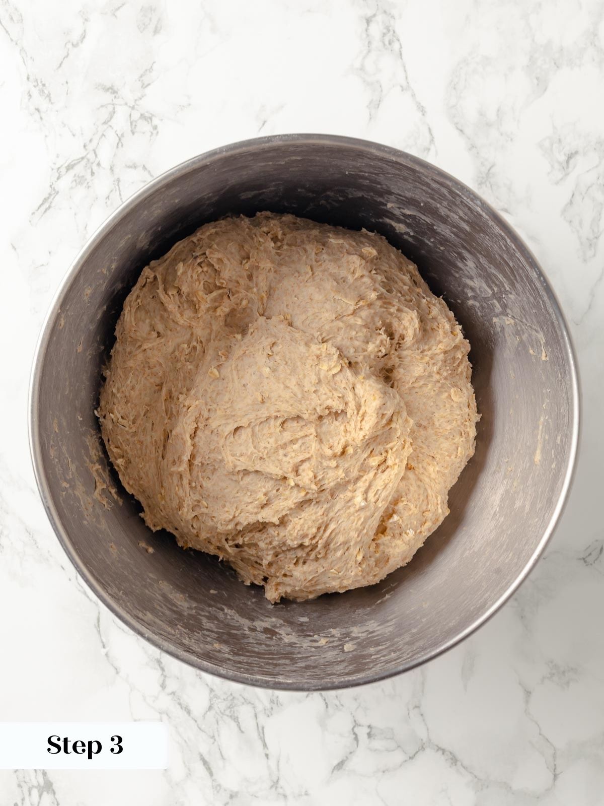 Dough ready to rest after kneading by hand.