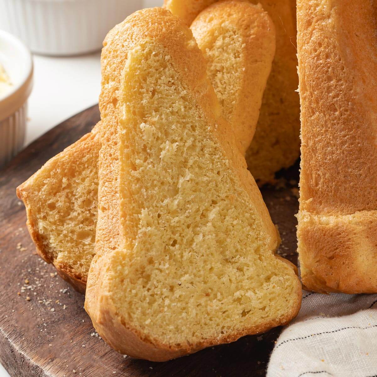 A slice revealing the pillowy soft interior of the bread.