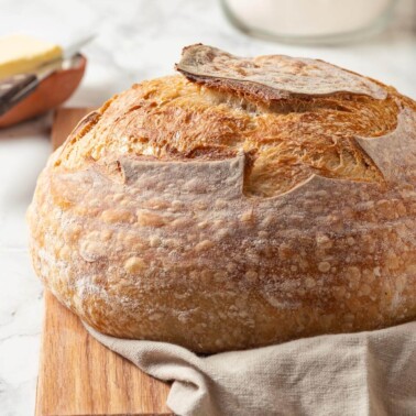 Crackly, rustic crust on freshly baked sourdough.