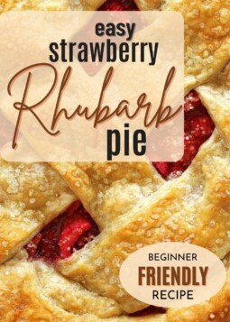 A pie with lattice crust showing thick strawberry and rhubarb filling.
