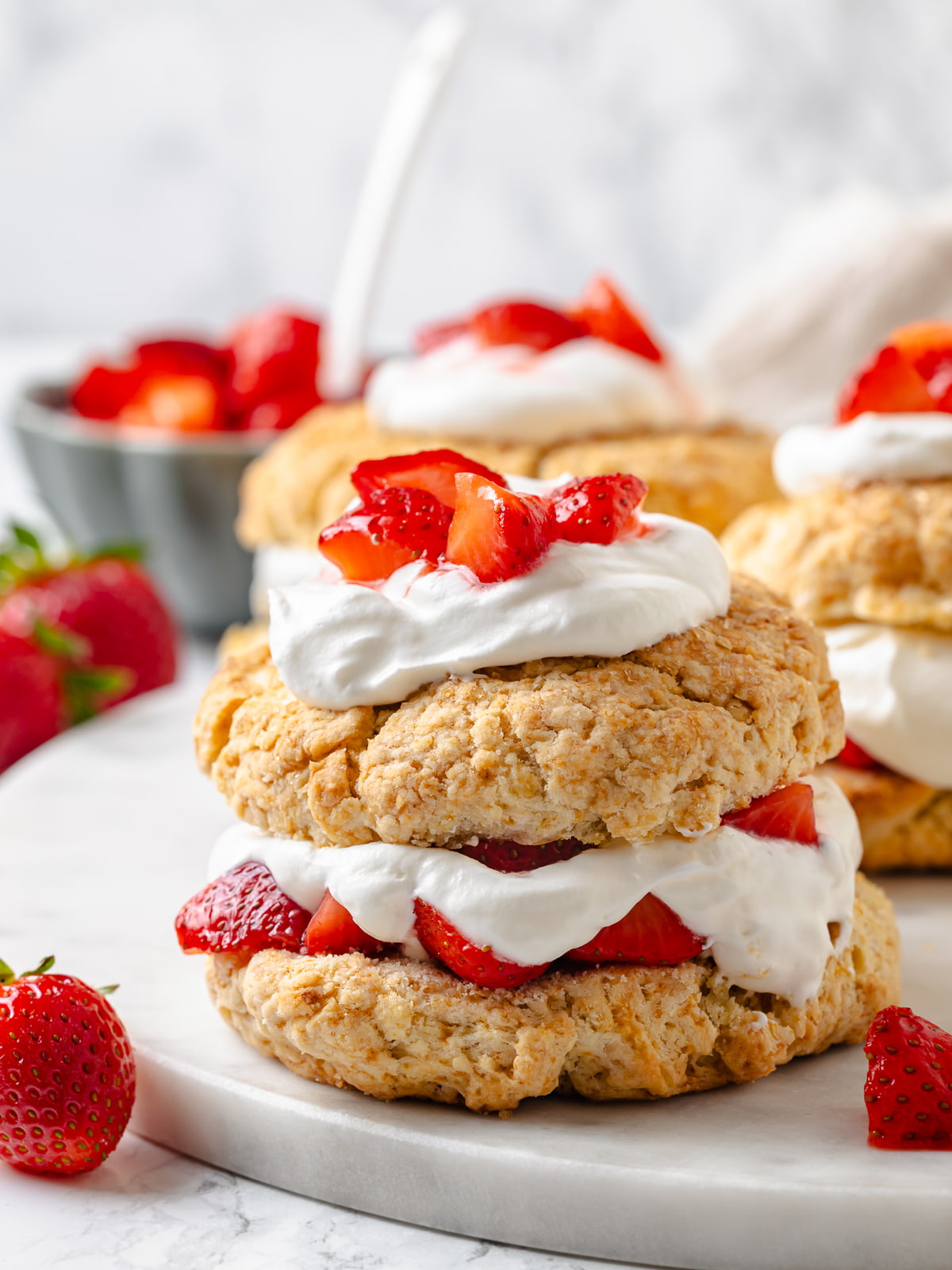 Buttery shortcakes with crisp edges freshly assembled.