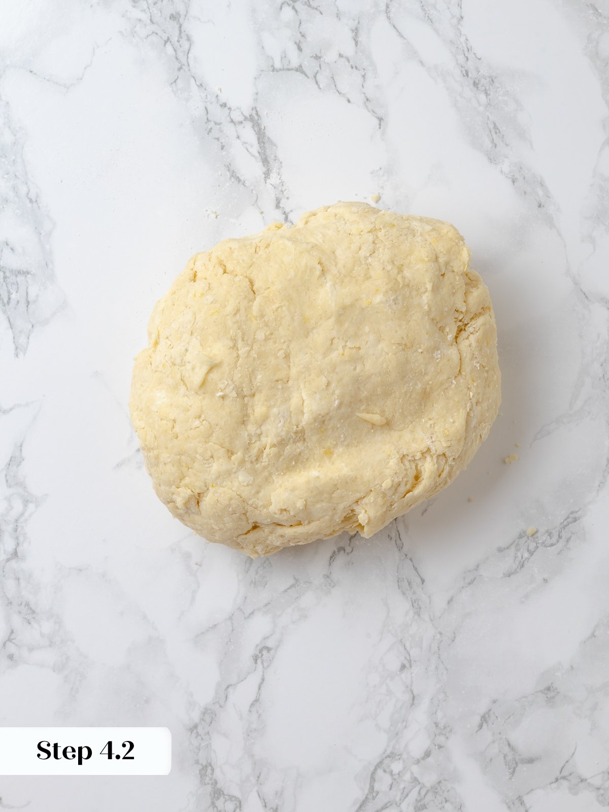 Finished shortcake dough shaped into a rough ball.