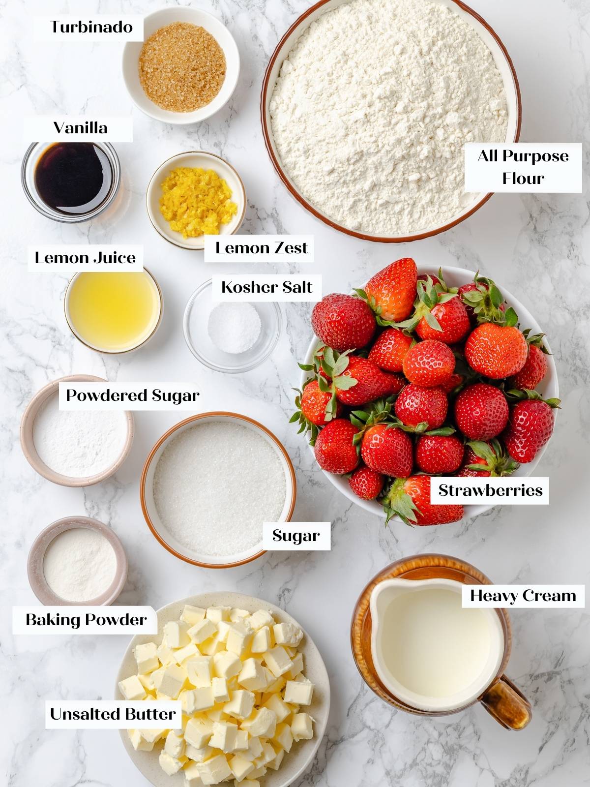 All ingredients for shortcake laid out on a kitchen counter.