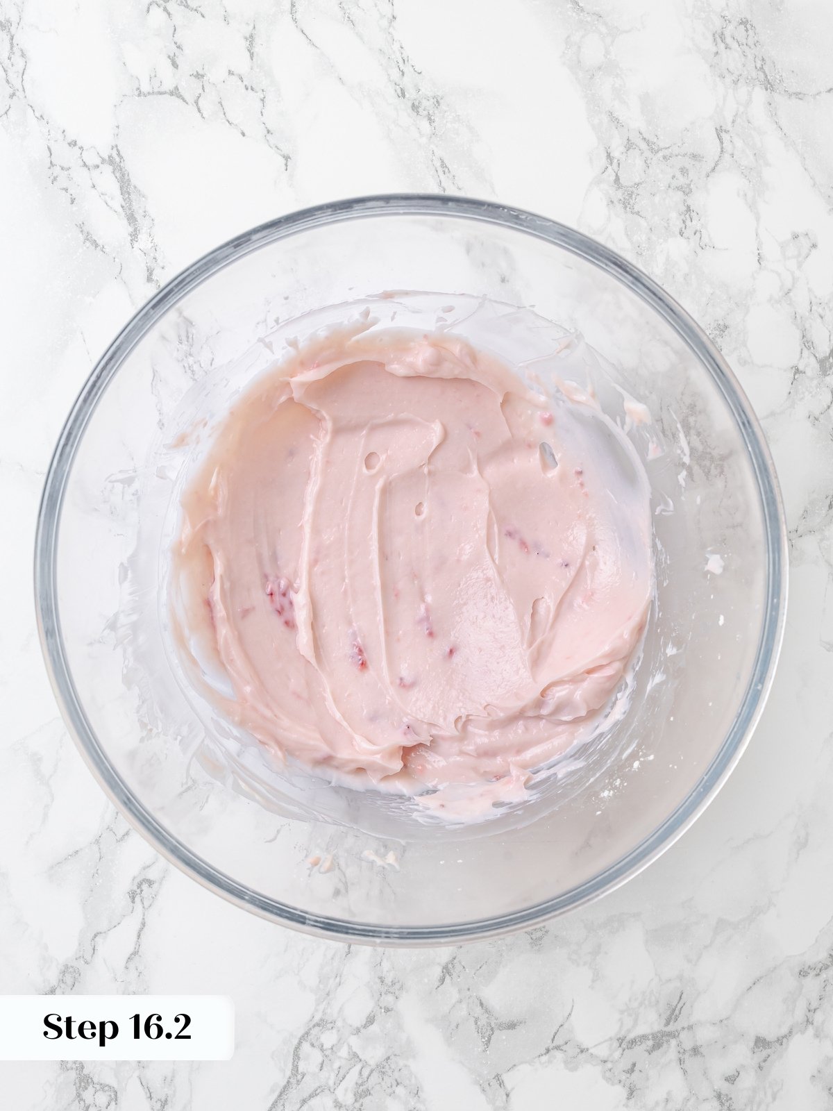 Finished icing in bowl for topping the rolls.