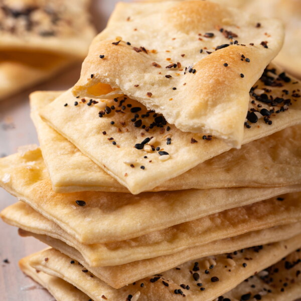 A cracker snapped to show hollow pockets and light interior from proper baking.