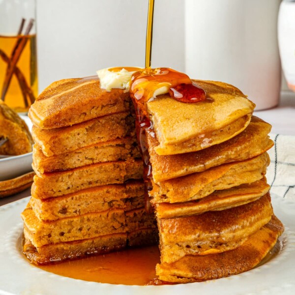 Cross section of pumpkin pancake showing the fluffy interior, moist and golden from cooking.