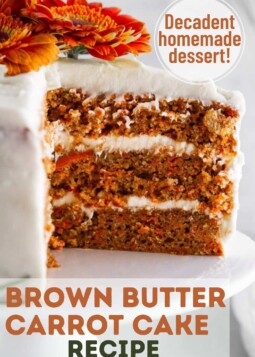 Brown butter carrot cake topped with decorative flowers. Text overlay reads decadent homemade dessert.