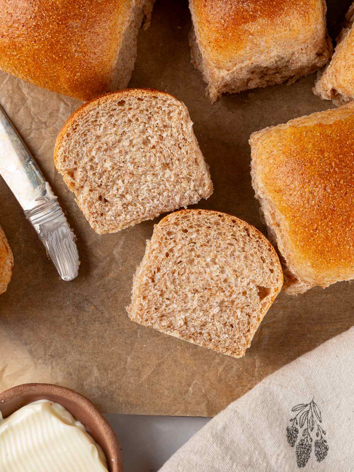 Soft inside of whole wheat sourdough roll demonstrating light texture and airy crumb.