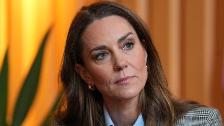 Catherine, Princess of Wales, listening during a visit of Fabal Beerhall at the Bermondsey Beer Mile