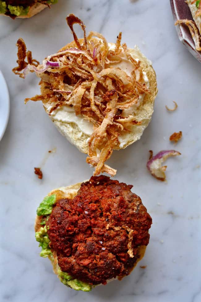 chorizo burgers with smashed avocado and crispy onions recipe
