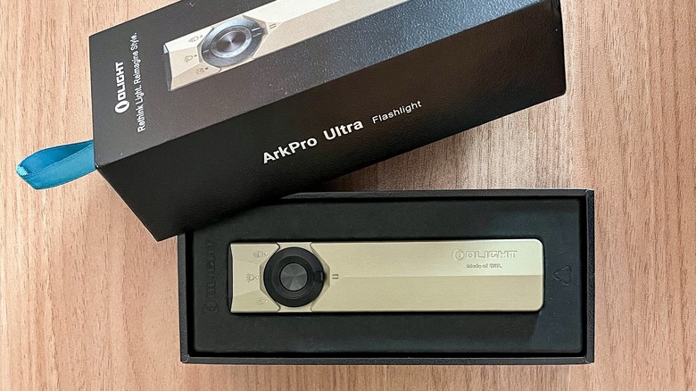 Olight ArkPro Ultra flashlight in open packaging