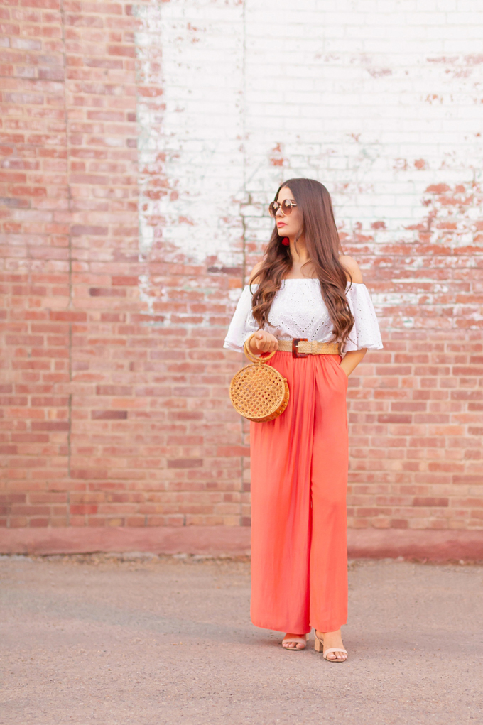LATE SUMMER 2019 LOOKBOOK | Living in Coral: How wear Pantoneβs 2019 Colour of the Year, Living Coral for Summer / Autumn 2019 l Summer/Fall 2019 Casual Outfit Ideas | How to Style Palazzo Pants for Summer / Fall 2019 | Brunette woman wearing Coral Palazzo Pants, a white Broderie Anglaise off-the-shoulder top, a bamboo bracelet bag and a woven tortoise buckle belt | Top Summer to Fall 2019 Transitional Trends and how to wear them | Calgary Fashion Blogger // JustineCelina.com
