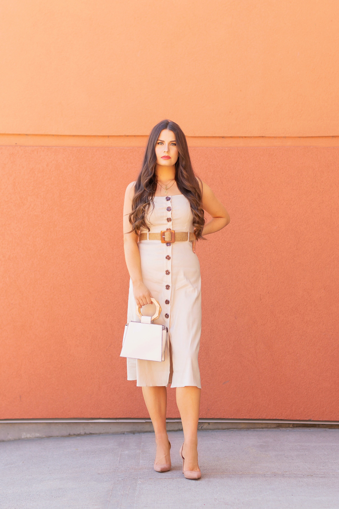 LATE SUMMER 2019 LOOKBOOK | Power Dressing: How to Style a Button-Down Linen Dress for the Office | How to Style Linen Dresses into Fall | The Best Power Dresses for Work | Summer/Fall 2019 Professional Outfit Ideas | Brunette woman wearing a tan button-down linen dress, tortoise framed cat eye sunglasses, a woven tortoise buckle belt, and cream a wooden-handle bracelet bag with nude dβorsay pumps | Top Summer to Fall 2019 Transitional Trends | Calgary Fashion Blogger // JustineCelina.com