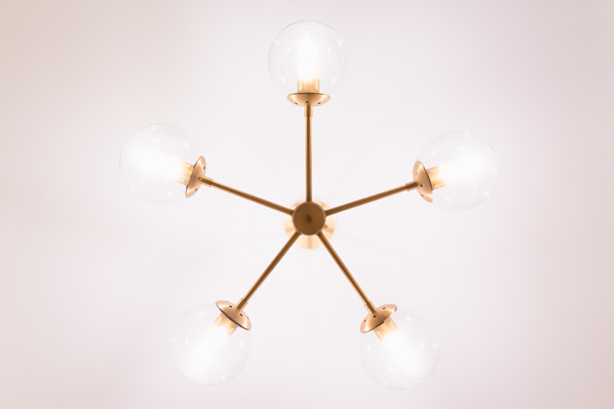 Space Refresh: Entrance Way Reveal in Partnership with Mobilia Canada | A Bohemian, Mid-Century Modern Apartment Entrance Way | Justine Celina Maguireβs Home | 2019 Home Decor Trends | Behr Ultra Pure White | Mobilia Aly Velji Modern India Collection Review | Bohemian, Mid Century Modern Decor | οΏΌWayfair Brass George Oliver Bruce 5-Light Sputnik Chandelier | Calgary Lifestyle, Interior Design and Home Decor Blogger // JustineCelina.com