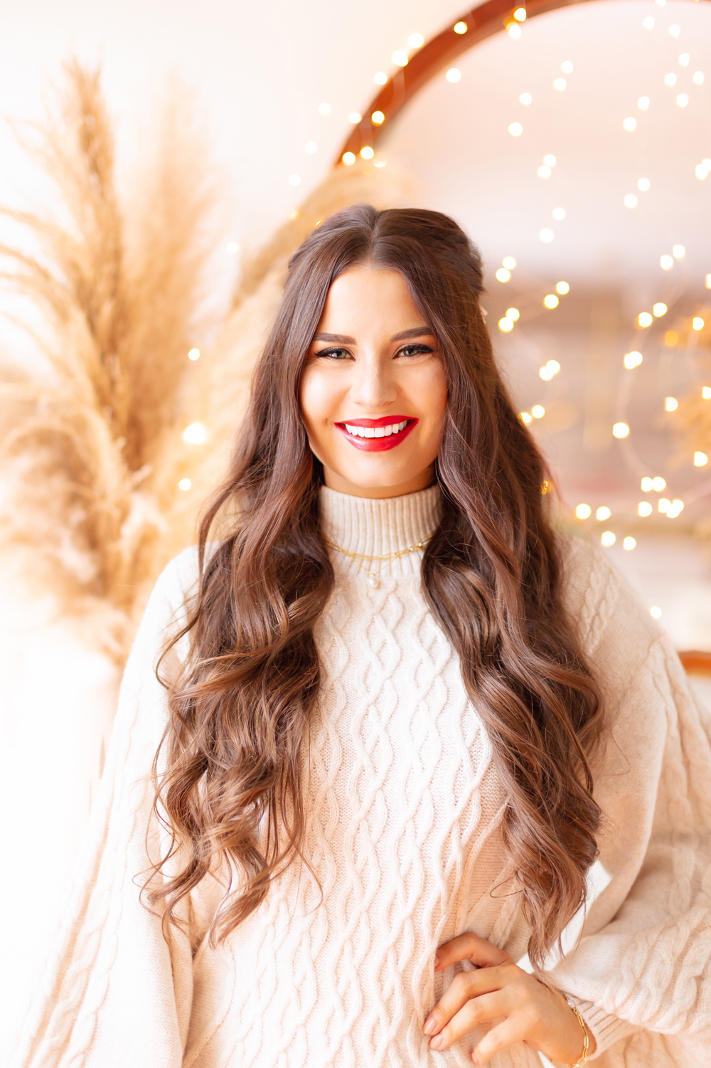 My Top 5 Red Lipsticks for the Holidays | LancΓ΄me Matte Shaker High Pigment Liquid Lipstick in Red-y In 5 photos, review, swatches | Brunette woman wearing a red lipstick and cable kit sweater dress in a festive holiday setting with bokeh lights | Best universal red lipstick | Best luxury red lipstick | Best red liquid lipstick | Best long lasting red lipstick | Best red lipstick 2021 | Christmas lipstick 2021 | Mask friendly red lipstick | Calgary Beauty Blogger // JustineCelina.com