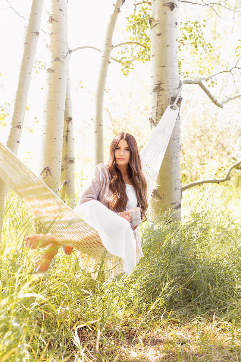 Summer 2020 Lookbook | Boho Summer 2020 Outfit Ideas | Summer Capsule Wardrobe | Summer Quarantine Outfits | Classic Summer Outfit Ideas | The Best CastaΓ±er Canvas Wedge Espadrille dupes | Summer to Fall Outfit Ideas | Classic Affordable Summer Style | Summer 2020 Trends | Best affordable wedge espadrilles | Brunette woman wearing a striped H&MDress and Cream ASOS DESIGN Time tie leg espadrille wedges in natural at sunset | Calgary Alberta Fashion Blogger // JustineCelina.com