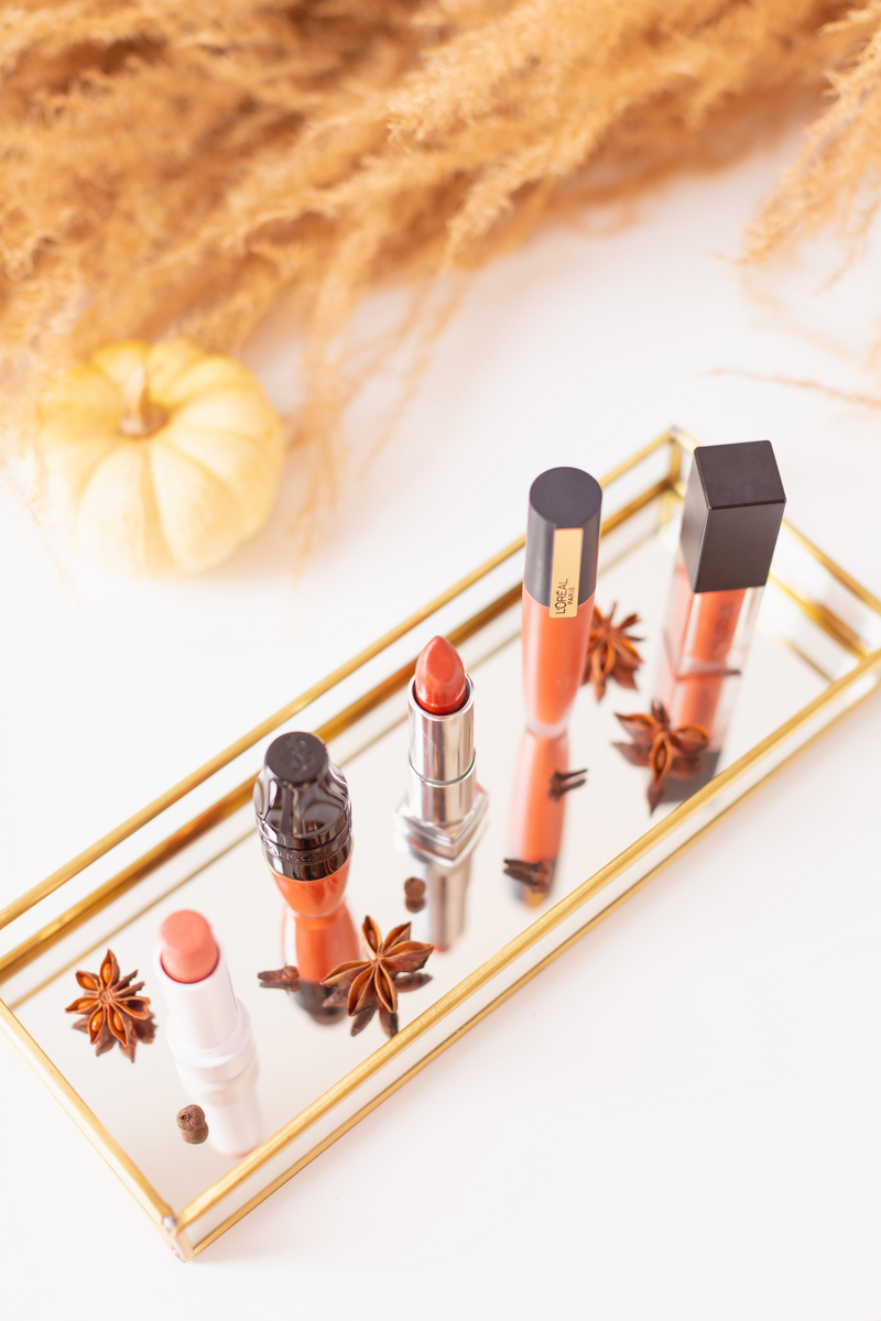 My Top 5 Pumpkin Spice Lipsticks | JustineCelinaβs favourite fall lipsticks | Beauty Bloggerβs Favourite fall lipsticks | The Best Pumpkin Spice Lipsticks for Fall | Lipstick Trends | Physicians Formula Organic Wear Tinted Lip Treatment in Gingersnap Review, LancΓ΄me Matte Shaker High Pigment Liquid Lipstick in Abrick Adabra Review, L'Oreal Rouge Signature Liquid Lip Colour in I Amaze Review, Smashbox Always On Matte Liquid Lipstick in Out Loud Review | Calgary Beauty Blogger // JustineCelina.com