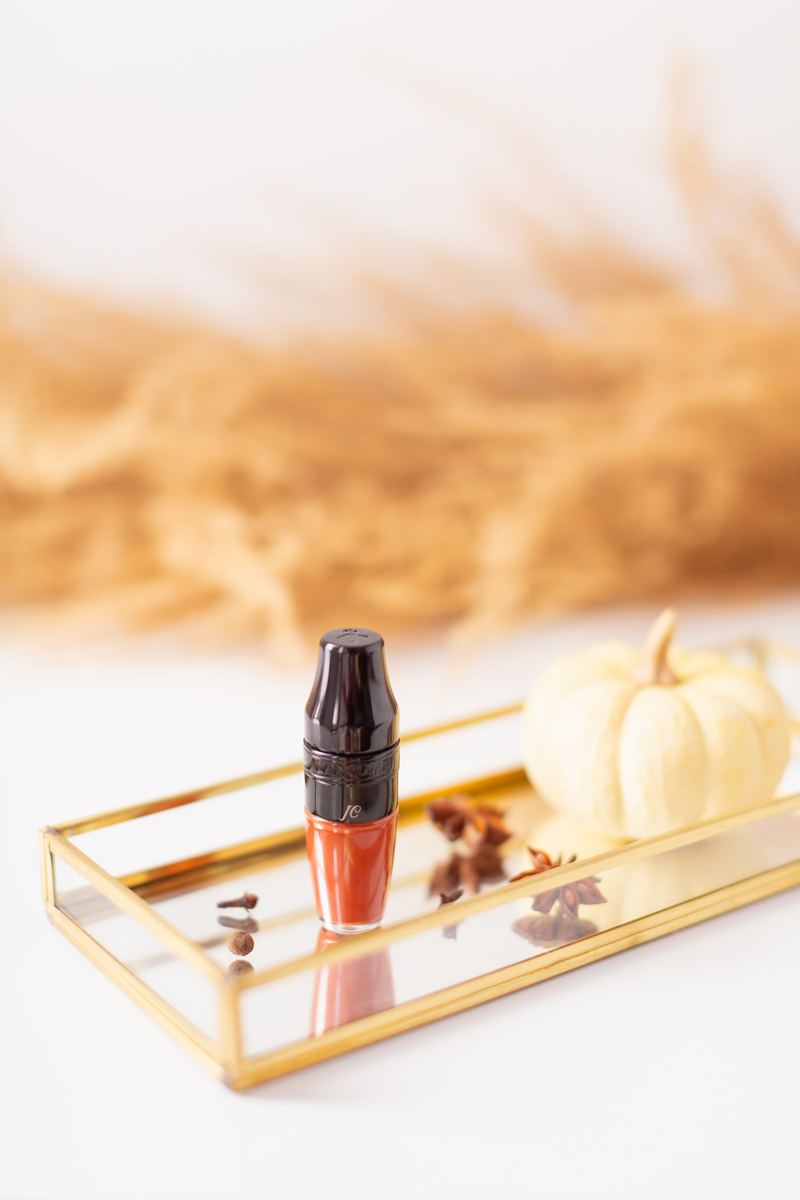 My Top 5 Pumpkin Spice Lipsticks | JustineCelinaβs favourite fall lipsticks | The Best Pumpkin Spice Lipsticks for Fall | Fall 2020 Lipstick Trends | LancΓ΄me Matte Shaker High Pigment Liquid Lipstick in Abrick Adabra Photos Review Swatches | The Best Luxury Fall Lipsticks | The Best Pumpkin Spice Lipsticks for Fall | Monogrammed lipstick on a Mirrored Tray with spices, a white mini pumpkin and pampas grass in the background // JustineCelina.com