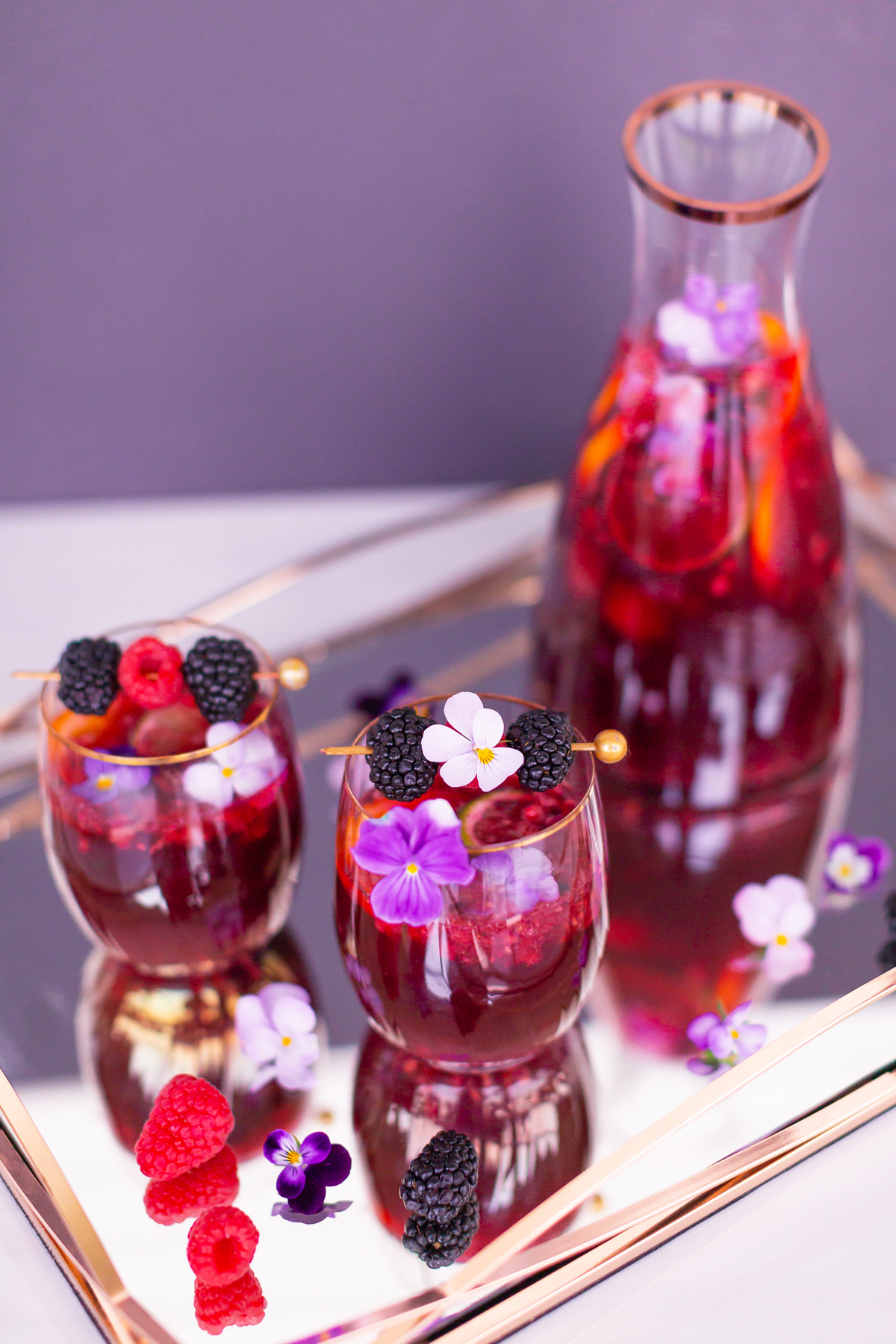 5 Cozy Fall Cocktail and Sangria Recipes | JustineCelinaβs Best Fall Cocktail and Sangria Recipes | Violette Noir Berry Sangria | The Best Berry Sangria Recipe | Pinot Noir Sangria | Chambord Sangria Recipe | Red Sangria with CrΓ¨me de Violette | The Best Berry Sangria for the holidays | Holiday Red Wine Sangria | Winter Berry Sangria Recipe | Healthy No Added Sugar Sangria // JustineCelina.com // Cocktail Photographer and Stylist | Calgary Blogger // JustineCelina.com