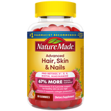 Nature Made Advanced Hair, Skin & Nails supplement bottle with red gummies inside.