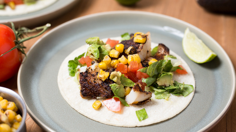 blackened fish taco on plate