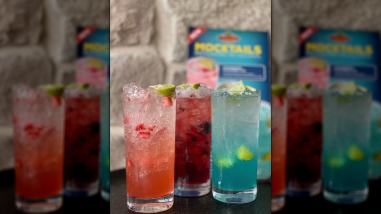 Three colorful drinks in on a table