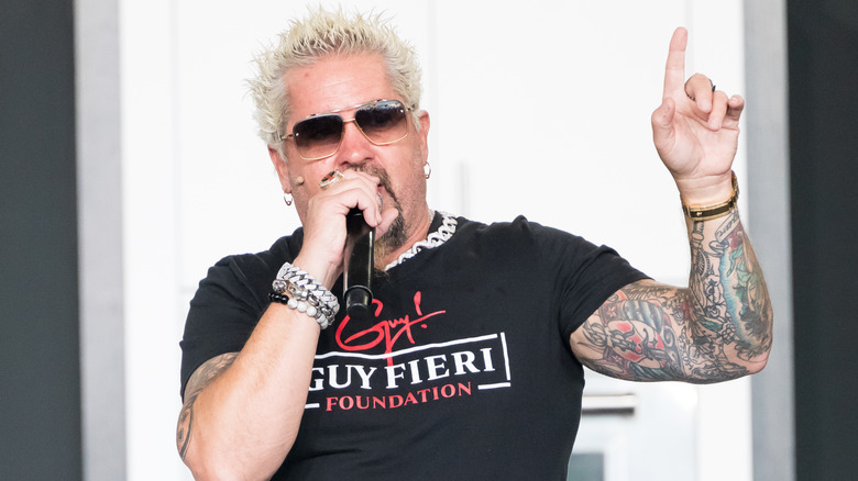 Guy Fieri speaking at event
