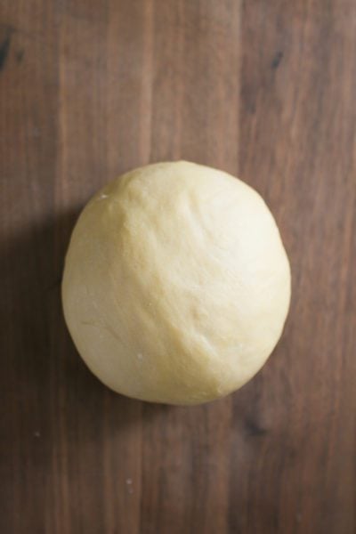 Ball of soft, smooth and supple homemade pasta dough.