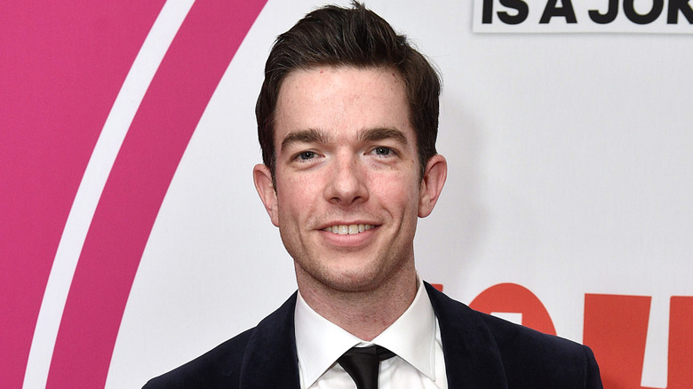 John Mulaney smiling