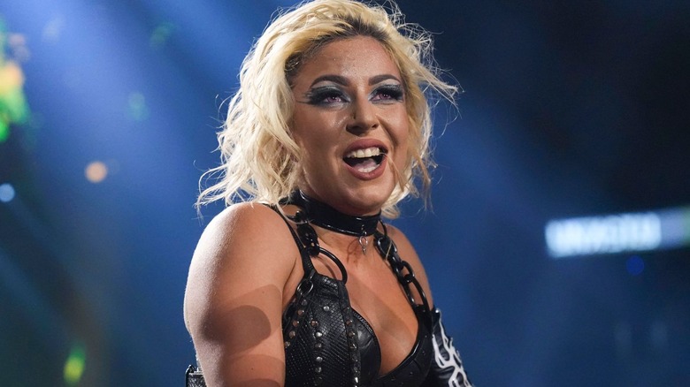 Thekla wearing a black top